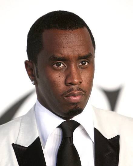 Sean Combs wearing a white shirt and a black tie.