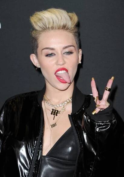 Miley Cyrus Parties in Pink Mesh Moschino Outfit and Pointy Pumps, Hot?