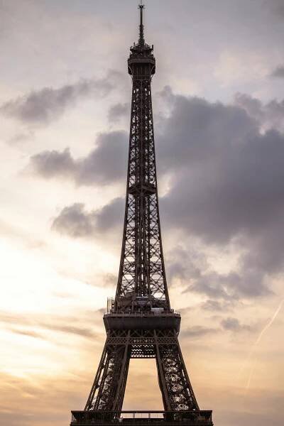Free Stunning view of the Eiffel Tower silhouetted against a vibrant sunset sky in Paris, France. Stock Photo