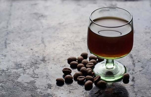 Kahlua Coffee Liqueur with Coffee Beans near its base