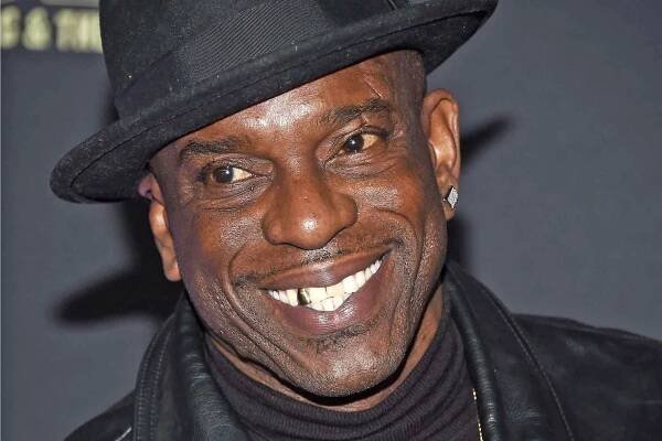 HOLLYWOOD, CA - FEBRUARY 22: Rapper Mopreme Shakur arrives at the premiere of USA Network's 