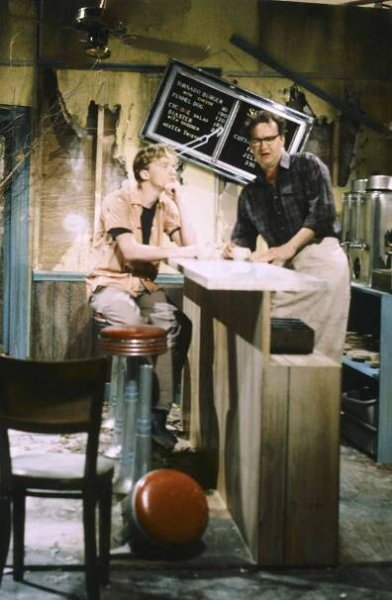 Anthony Michael Hall as Lonnie, Randy Quaid as Bud Stubbs during the 'Tornadoville' skit on May 17/1986