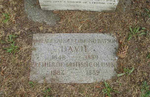 This newer grave marker has been placed in the ground at the base of Alexander Davie's original grave marker.