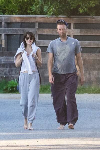 Dakota Jonhson and Chris Martin step out.