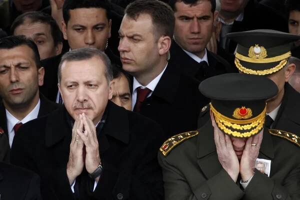 Erdogan and Chief of General Staff General Ilker Basbug at a funeral in Ankara, February 2010.