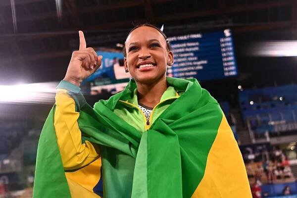 Brazil's Rebeca Andrade celebrates winning gold in the vault event of the artistic gymnastics women's vault final during the Tokyo 2020 Olympic Games at the Ariake Gymnastics Centre in Tokyo on August 1, 2021.