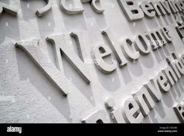 Welcome board with greeting on foreign languages Stock Photo
