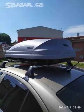 Střešní box Thule .