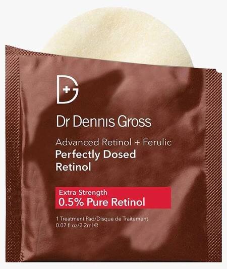 Dr. Dennis Gross Advanced Retinol  Ferulic Perfectly Dosed Retinol brown packet of creamy serum on light gray background