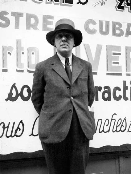 André Breton circa 1930 in front of La Coupole