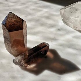 The Punctilious Mr. P's healing smoky quartz crystals on marble top