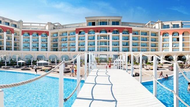 Outdoor pool and bridge at Lighthouse Hotel