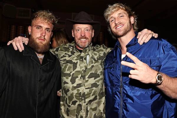 Jake Paul, Greg Paul, and Logan Paul at an afterparty.