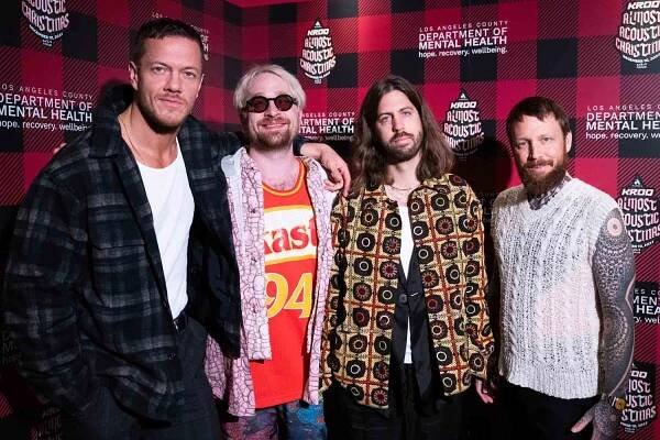 Musicians Dan Reynolds, Daniel Platzman, Wayne Sermon and Ben McKee of Imagine Dragons attend Audacy's 
