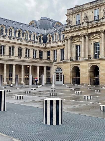 rows of pillars in a renaissance-style palace courtyard in Paris