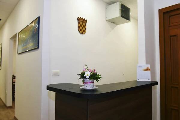 TV a/nebo společenská místnost v ubytování Riva Rooms