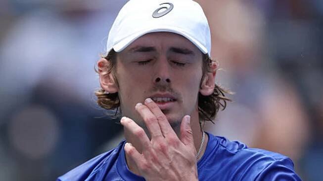 Alex de Minaur of Australia reacts while playing against Felix Auger-Aliassime of Canada.