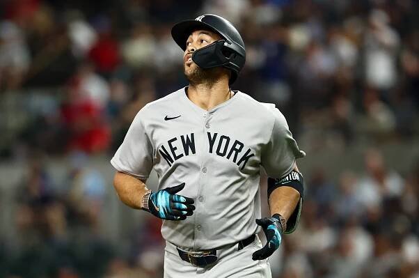 Giancarlo Stanton jogs back to the dugout after grounding into a double play as a pinch hitter in the ninth inning of the Yankees' 2-0 loss to the Rangers on Aug. 5, 2025.
