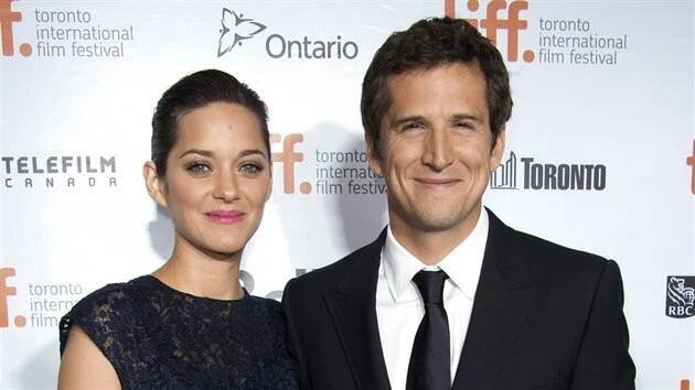 Marion Cotillardová a Guillaume Canet (Toronto, 9. září 2013)