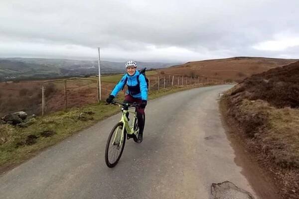 Simon Ward riding e-bike