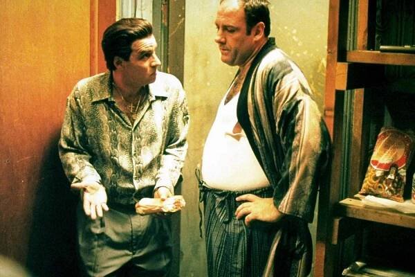 Actors Steve Van Zandt (L) & James Gandolfini in scene from HBO TV dramatic series The Sopranos. 