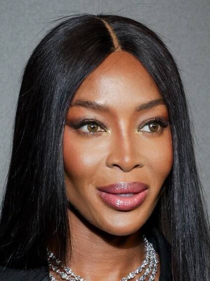 Naomi Campbell Is a '70s Disco Queen With Massive Curly Hair — See Video