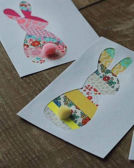 two bunny shaped cards with buttons on them