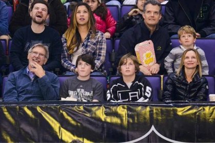 Harrison Ford, Liam Flockhart and Calista Flockhart attend a hockey game between the Carolina Hurricanes and the Los Angeles Kings at Staples Center on March 1, 2014.