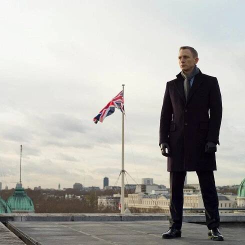 Flag, Trousers, Collar, Coat, Dress shirt, Suit trousers, Outerwear, Standing, Suit, Formal wear, 