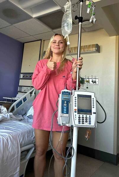  25-YEAR-OLD JESSICA JOHNSON ON AN IV DRIP after exploding muscle.