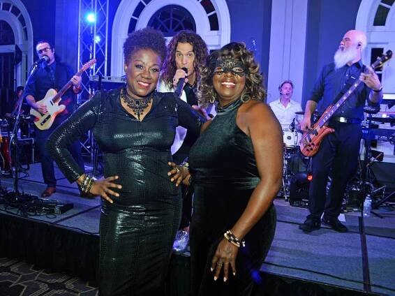 Today_s Woman_s Pamela Williams (L), and Carla Wright (R) photobombed by The Crashers_ Mark Maxwell