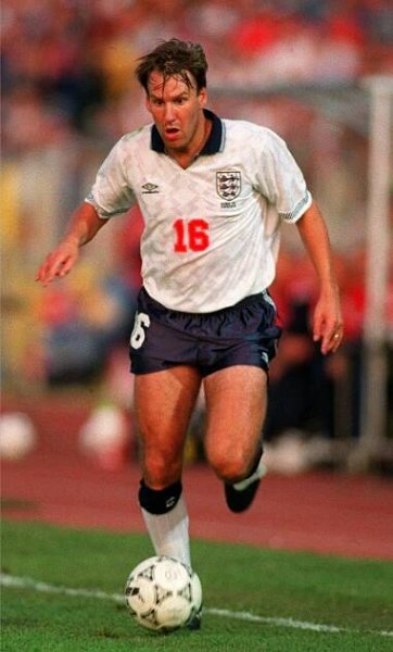 a soccer player with the number 16 on his jersey