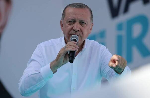 Turkish President Tayyip Erdogan addresses his supporters during an election rally in Ankara