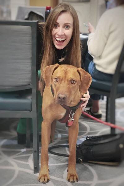 A Regrello industry expert with Cooper the dog.