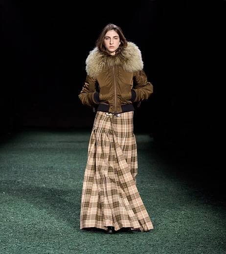 Model in Shearling trim cropped satin parka in bison