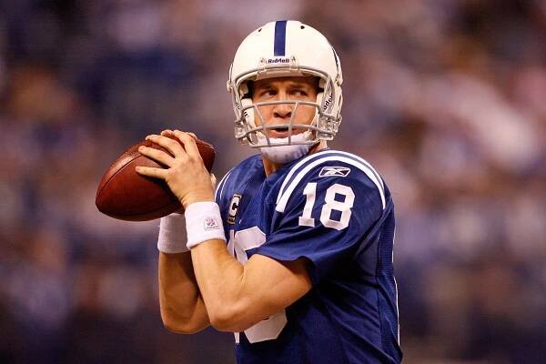 Quarterback Peyton Manning #18 of the Indianapolis Colts thows the ball against the Baltimore Ravens during the AFC Divisional Playoff Game at Lucas Oli Stadium on January 16, 2010 in Indianapolis, Indiana. 