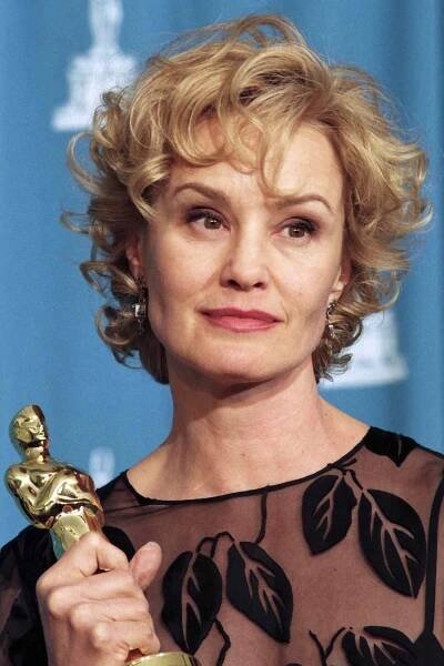 Jessica Lange poses with her Best Actress Oscar for 'Blue Sky' backstage during the 67th annual Academy Awards at the Shrine Auditorium in L.A. on March 27, 1995