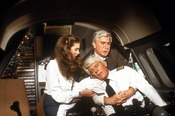 Julie Hagerty, Leslie Nielsen and Peter Graves in 1980's 