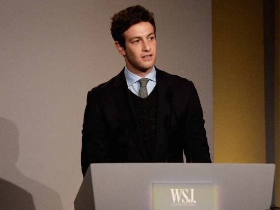 Josh Kushner speaks onstage at the WSJ. Magazine's 