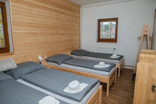 Postel nebo postele na pokoji v ubytování Vilka Viktorka