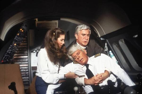 Don’t call me Shirley: Leslie Nielsen alongside Julie Hagerty and Peter Graves in ‘Airplane!'