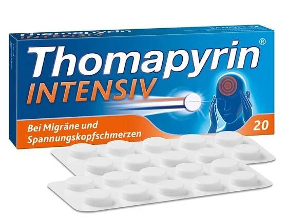 Thomapyrin INTENSIV-Schachtel und zwei Blisterpackungen mit weißen Tabletten. Aufschrift: Bei Migräne und Spannungskopfschmerzen.