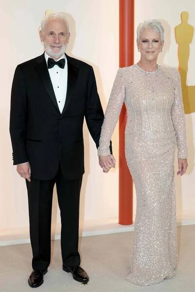 Jamie Lee Curtis and Christopher Guest at the 2023 Academy Awards red carpet