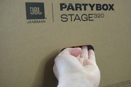JBL PartyBox STAGE 320 box side hand