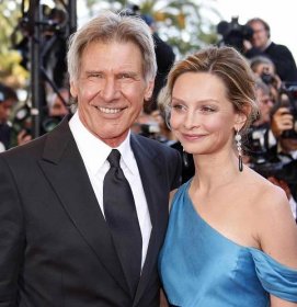 Harrison Ford (L) and his partner and actress Calista Flockhart pose as they arrive to attend the screening of US director Steven Spielberg's film 'Indiana Jones and the Kingdom of the Crystal Skull' at the 61st Cannes International Film Festival on May 18, 2008 in Cannes, southern France. The world premiere of the latest instalment in the "Indiana Jones" saga, the first in 19 years, is the hottest ticket at this year's Cannes film festival
