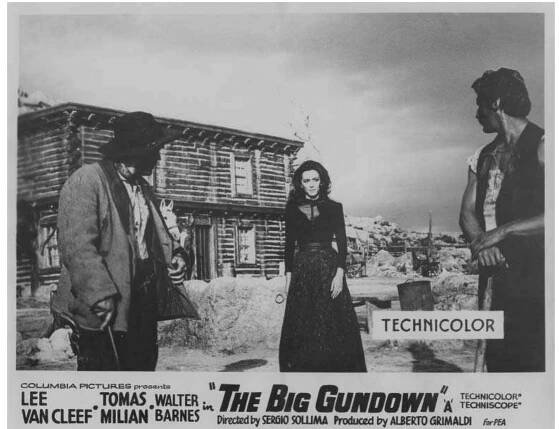 The widow (Nieves Navarro), flanked by two of her wranglers (Frank Brafia and Romano Puppo), in a UK front-of-house still advertising The Big Gundown (1967).  the Italian version, as she tries to lure Corbett into a liaison. When Corbett leaves 