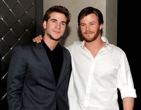 Liam Hemsworth Says Chris Hemsworth Paid Off Their Parents' Debts