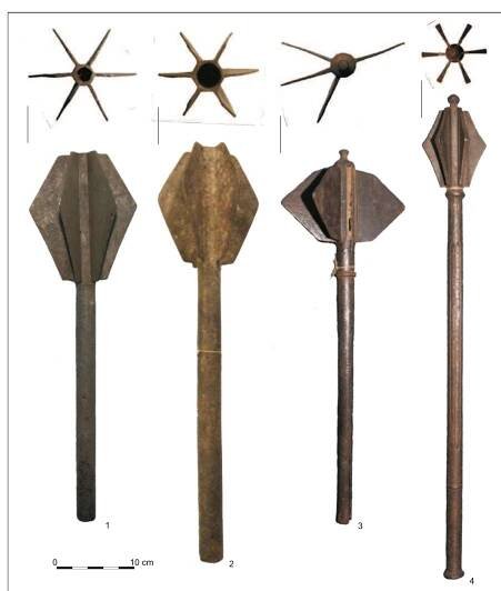 Fig. 3. High flanged maces with long shaft: 1 — Mace (Georgian National Museum, Inv. No. 35-35/244); 2 — Mace (Svaneti Museum of History and Ethnography, Inv. No. 725); 3 — Mace (Georgian National Museum, Inv. No. 35-35/247); 4 — Mace (Georgian National Museum, Inv. No. 44-26/19). Photo by M. Tsurtsumia. 