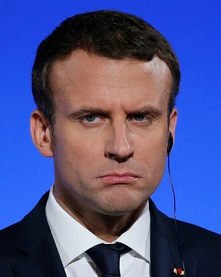Macron slaps down defense chief, pledges higher spending
