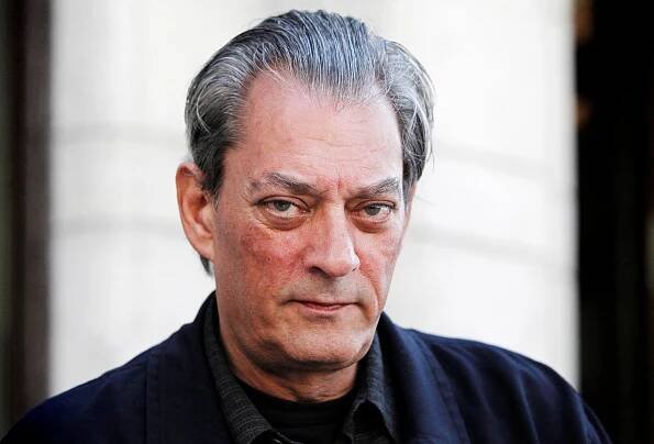 U.S. author Paul Auster poses for a photograph before an interview in Stockholm May 10, 2011.